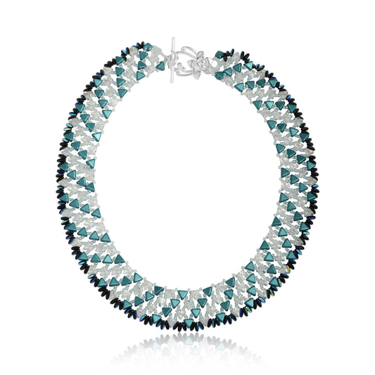 Handwoven geometric necklace with white, mint and dark blue beads in a symmetrical frost-like pattern, shown on white background