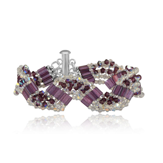 Bracelet handwoven with deep amaranth-purple and silver crystal beads in a geometric pattern, on white background